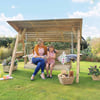 Relaxing outdoor wooden garden swing with canopy in a lush backyard garden. Perfect for outdoor leisure, family fun, and garden decor from Empire Home and Garden.