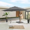 Stylish outdoor patio with large grey umbrella, potted plants, and cozy decor, perfect for garden entertaining and shade. Modern backyard setup ideal for relaxing and outdoor gatherings.