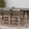 Stylish outdoor dining set with a large rectangular table, woven rattan chairs with beige cushions, ideal for garden or patio furniture, from Empire Home and Garden.