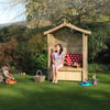 Playhouse wooden garden playhouse with kids playing and woman sitting, outdoor children’s play area, backyard garden entertainment, safe outdoor wooden playstructures for children, family garden activities.