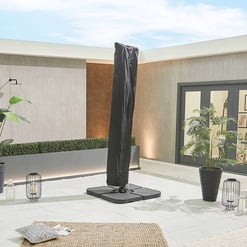 Outdoor patio with fire pit and large potted plants, modern design, stylish decor, perfect for entertaining and relaxation, featuring patio furniture, planters, and ambient lighting.