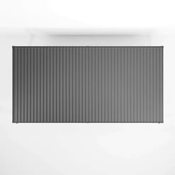 Modern gray metal garage door with vertical ribbed design, ideal for enhancing curb appeal and security in residential properties. Perfect for home improvement projects.
