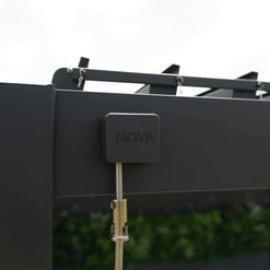 Stainless steel locking mechanism on a modern outdoor appliance or structure, emphasizing security and durability.