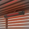 Aluminum patio heater mounted under a wooden pergola, outdoor heating solutions for gardens and patios, modern outdoor patio heater with infrared heating, stylish and efficient outdoor heating for home and garden, relevance.