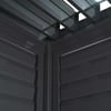 Black metal outdoor storage shed with multiple drawers and structured design for garden and yard organization.