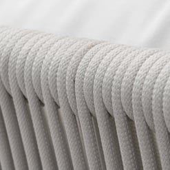 Soft, plush mattress with a white, textured cover, showcasing a close-up of the fabric and quilting details at Empire Home and Garden.