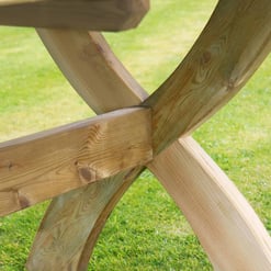 Handcrafted wooden garden table with sturdy outdoor construction, perfect for enhancing your backyard decor and outdoor living space.