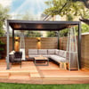 Stylish outdoor patio with a modern gazebo, cozy sectional sofa, patio heater, and wooden deck, perfect for relaxing or entertaining in a backyard garden setting.