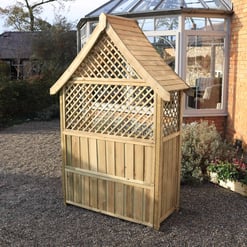 Heavy-duty wooden chicken coop with a shingle roof, lattice panels for ventilation, and a solid base, ideal for outdoor garden poultry enclosures.