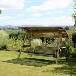 Classic wooden garden swing with canopy, perfect for relaxing outdoors in your backyard or garden. Durable construction offers comfortable seating and shade on sunny days.