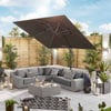 Luxurious outdoor patio with sectional sofa, large patio umbrella, and stylish decor, perfect for relaxing and entertaining in a modern garden setting.