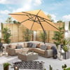 Stylish outdoor patio featuring a beige sectional sofa, large patio umbrella, potted plants, and decorative lanterns, perfect for outdoor living and entertaining.
