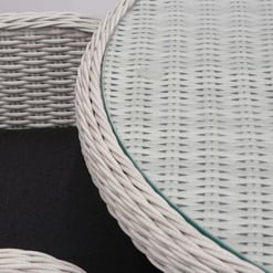 Modern outdoor wicker patio furniture with glass-top table and black cushion, ideal for stylish backyard or garden decor at Empire Home and Garden.