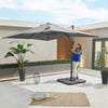 Elegant outdoor patio with a large adjustable umbrella, potted plants, and stylish decor, perfect for relaxing and entertaining in your backyard.