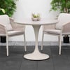Modern outdoor patio dining set with a round table and two stylish chairs surrounded by lush greenery. Perfect for garden or backyard entertaining.