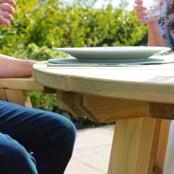 Natural wood outdoor dining table for summer gatherings, perfect for garden or patio entertaining, featuring durable, handcrafted rustic furniture from Empire Home and Garden.