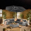 Stylish outdoor patio with a modern sectional sofa, large umbrella, and ambient lighting, ideal for backyard entertaining and garden relaxation, featuring Empire Home and Garden outdoor furniture.