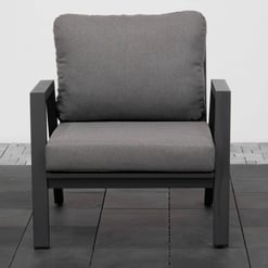 Comfortable outdoor patio chair with gray cushions and black metal frame, perfect for garden or porch seating.