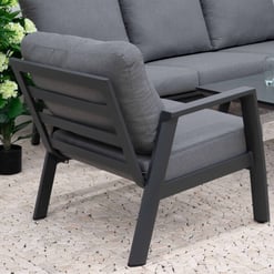 Modern outdoor patio furniture with gray cushions and a black metal frame, perfect for garden or backyard seating.