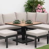 Stylish outdoor patio furniture set with cushioned sectional sofa, matching ottomans, and a wooden dining table, ideal for garden dining and entertaining.