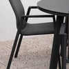 Sleek black dining chair with upholstered seat and backrest, perfect for modern home and garden outdoor or indoor dining setups.