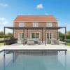 Modern brick home with a backyard patio and swimming pool, perfect for outdoor entertaining and relaxation. Features outdoor furniture, a grill, and a stylish pergola under a clear blue sky.