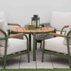Elegant outdoor patio furniture set featuring modern chairs with beige cushions and a wooden table, perfect for garden or patio decor, offering stylish comfort for outdoor living and entertaining.
