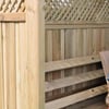 Natural cedar wood garden privacy fence with lattice top, ideal for backyard landscaping and outdoor living.