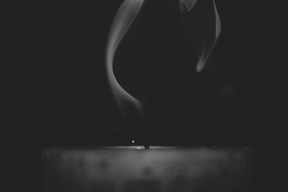 Karif Battle, founder of Theoretical Fiends LLC, got this photo, by George Becker, from Pexels and converted to grayscale. A spent candle bleeds tendrils of smoke.