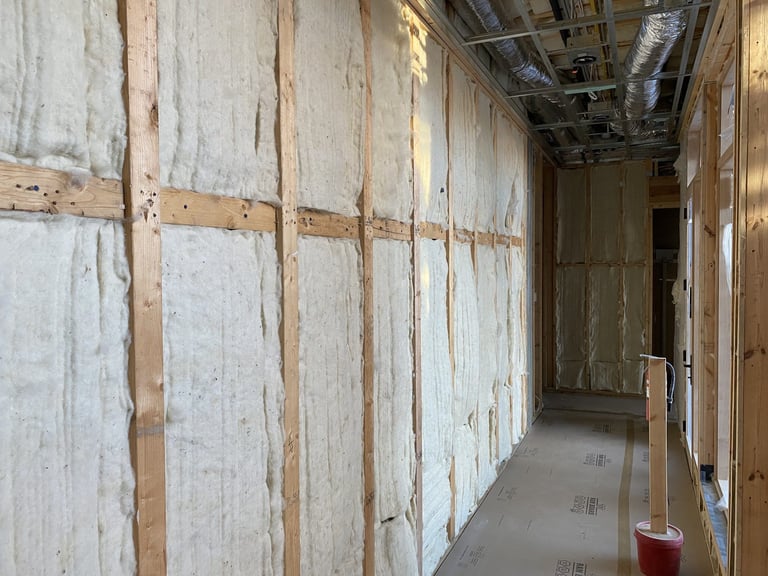 Professional insulation installation service for residential or commercial property improvement.
