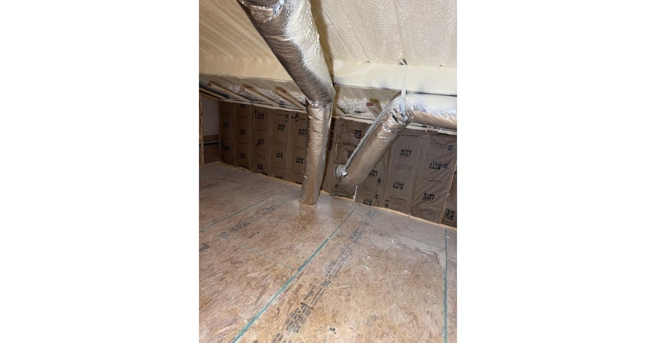Twenty-Foot Ceilings. A New Metal Home. An Insulation Job Raymond Wanted Done Once.