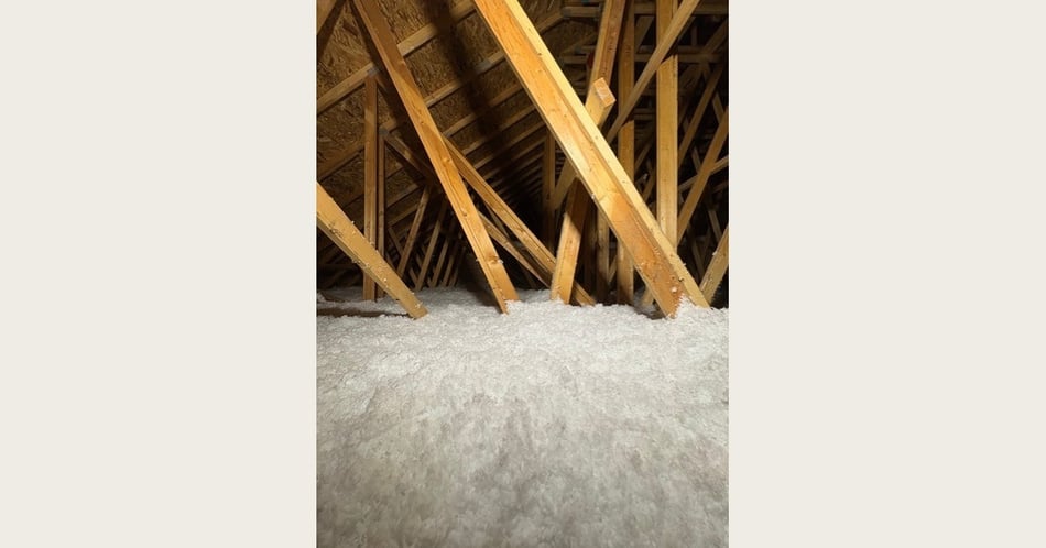 Fiberglass Blown-In Insulation Above a Garage in Waunakee, WI