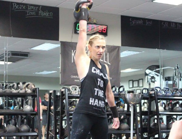 Kindal kettlebel snatching in a womens strength and kettlebell competition