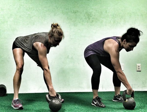 Kindal and Alex training kettlebells together