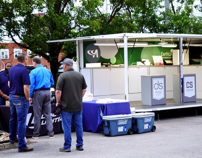 men standing outside with a truck showing lighting product
