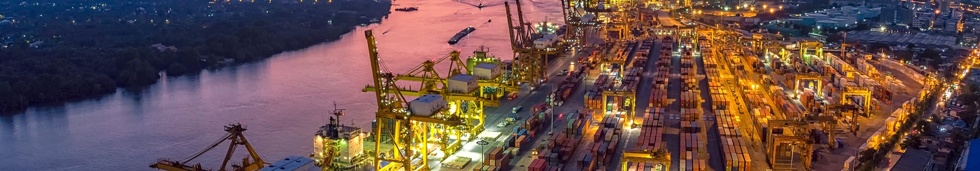Logistics and transportation of Container Cargo ship and Cargo plane with working crane bridge in shipyard at sunrise, logistic import export and transport industry background