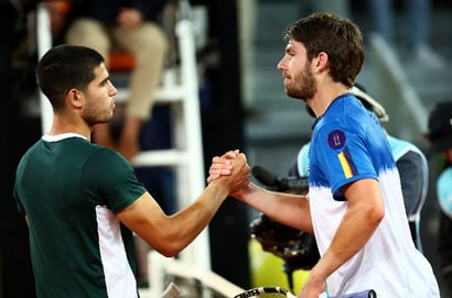 Cameron Norrie Carlos Alcaraz hands