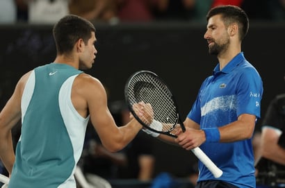 Carlos Alcaraz Novak Djokovic hands