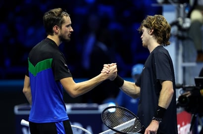 Daniil Medvedev hands Andrey Rublev