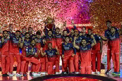 RCB with the IPL trophy