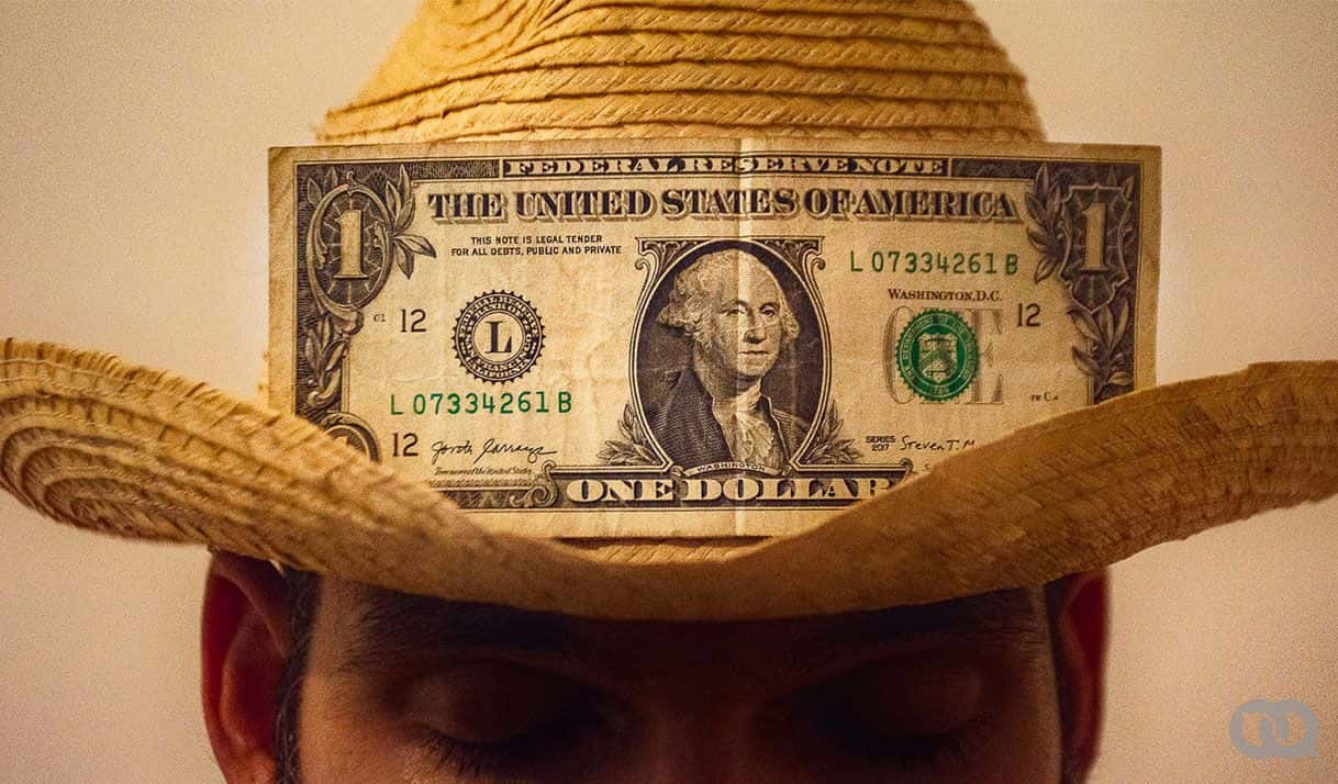dólar  persona sombrero