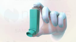 Hand Holding Metered-Dose Inhaler