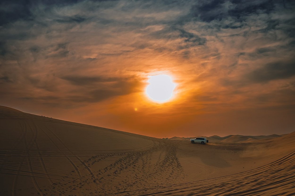 Sunset during liwa overnight desert safari