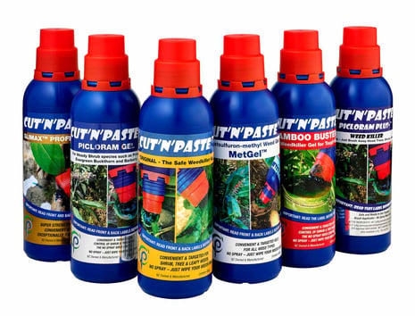 cutnpaste weed gels _1600 A group of 6 blue plastic weedgel bottles all with red caps
