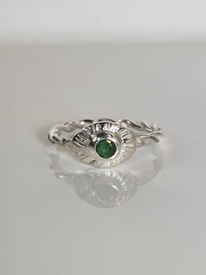 Emerald Sunburst ring with a twist