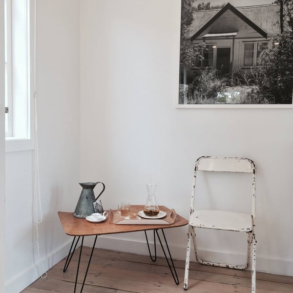Original cottage in picture above chair