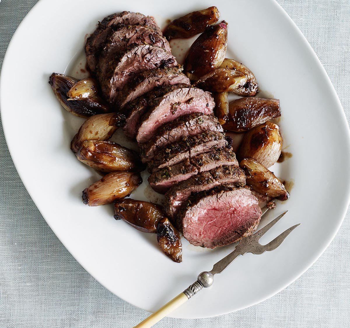 Roast fillet of beef with balsamic glazed shallots