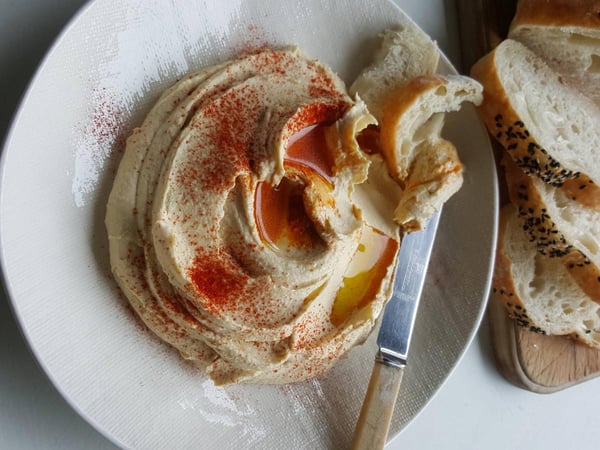 hummus with knife