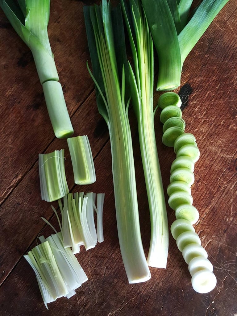 Leek & Bacon Tartlets|Leek & Bacon Tartlets|Cheese straws|Cheese straws|Cutting cheese straws|Cutting out pastry|Cutting cheese straws|Leek & bacon filling|Lining tartlet tray|||Leeks|Sliced leeks|Sliced leeks|Sliced leeks