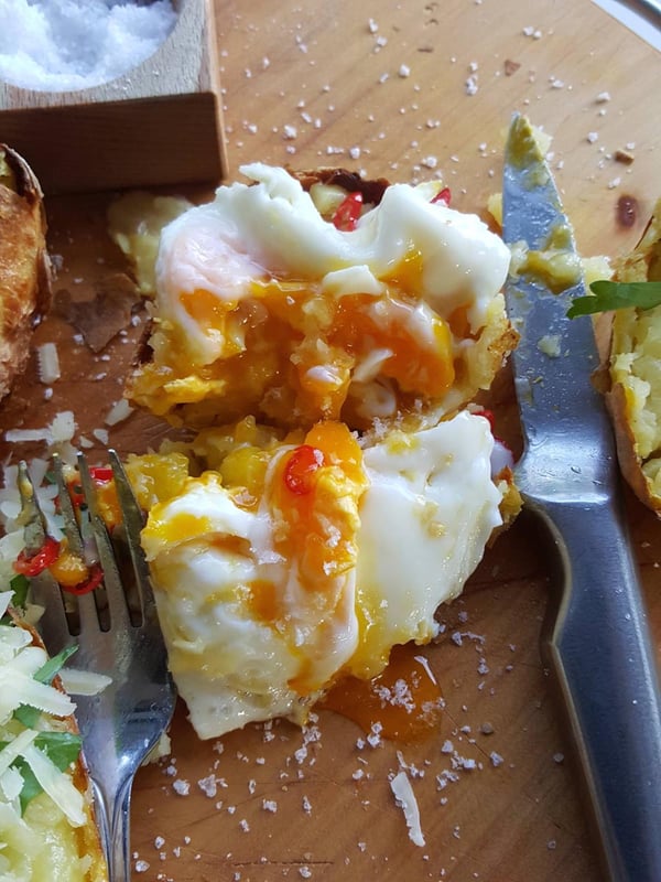 Jacket potato with halved egg